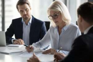 Certified CMMC Assessor (CCA) guiding a company through CMMC 2.0 Level Certification